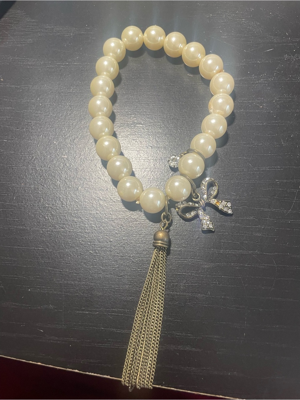 Pearl Bead Bracelet with Gold Tassel and Rhinestone Bow